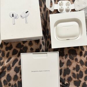 Apple AirPods Pro with White Charging Case